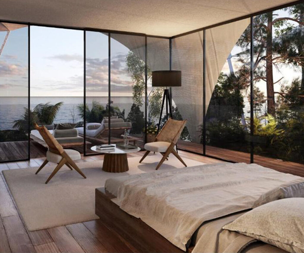 Acomodação do Silversands com paredes de vidro e vista para o oceano — dica de resorts no caribe