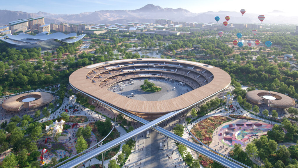 A imagem retrata uma cidade futurista com um grande estádio circular no centro, cercado por áreas verdes exuberantes. Há edifícios modernos e estruturas únicas ao fundo, incluindo balões de ar quente e uma arquitetura inovadora. A cidade é conectada por vias elevadas e possui áreas de lazer e recreação.