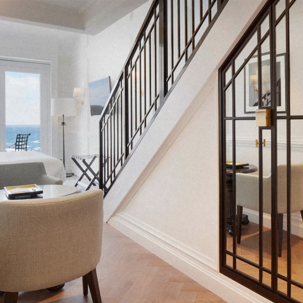 Detalhe de design de interiores no Hotel Villa Favorita San Sebastian com piso espinha de peixe e divisória metálica.