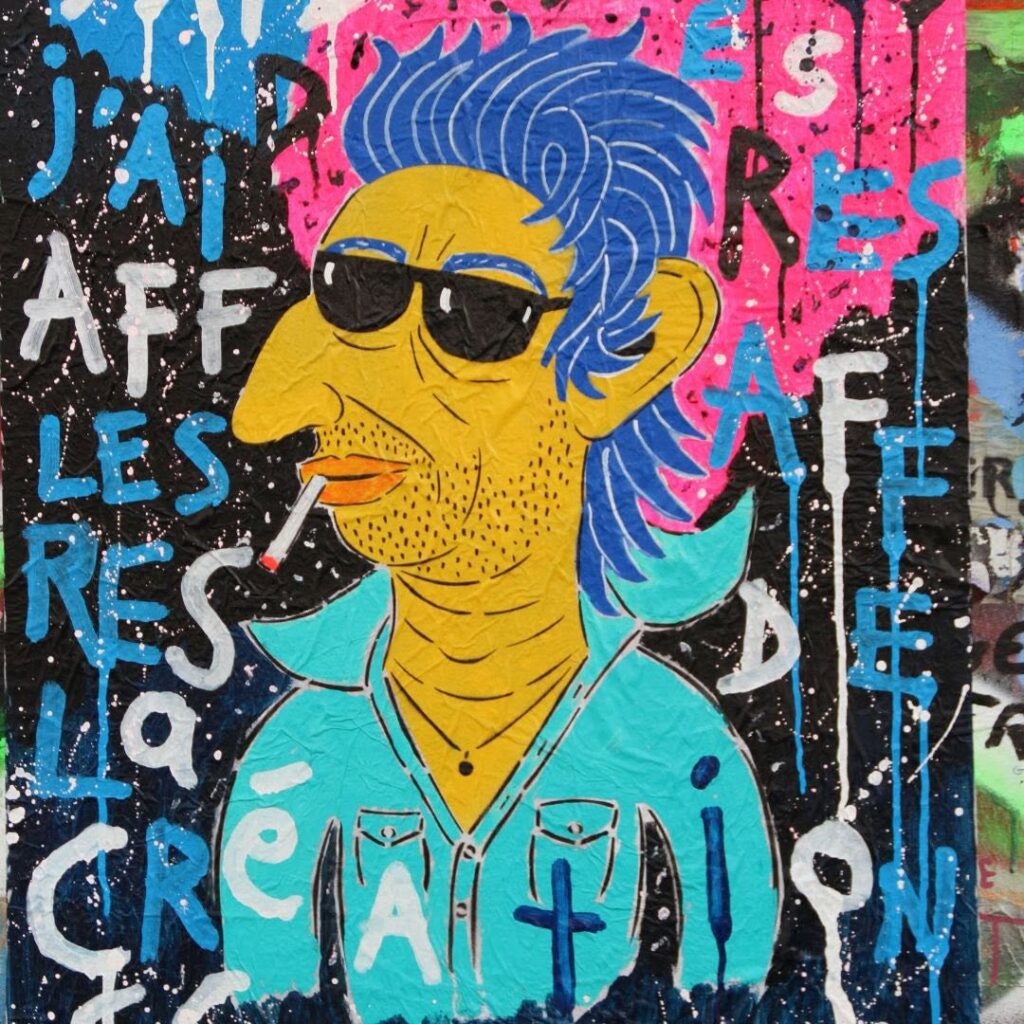 Arte urbana e grafite na fachada da Maison Gainsbourg, atração de museus pequenos em paris.